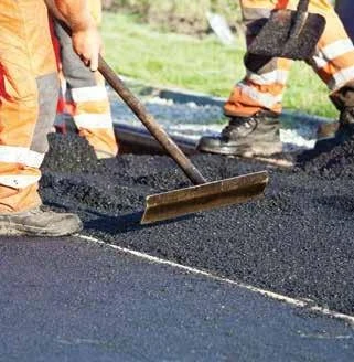 Asphalt paving crew